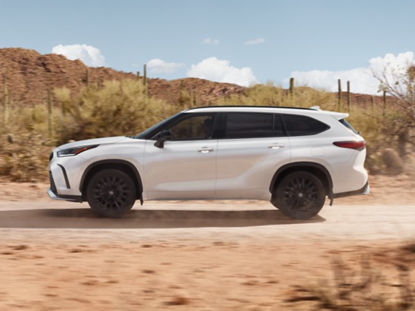 2026 Toyota Highlander Limited AWD interior shown in Graphite leather trim
