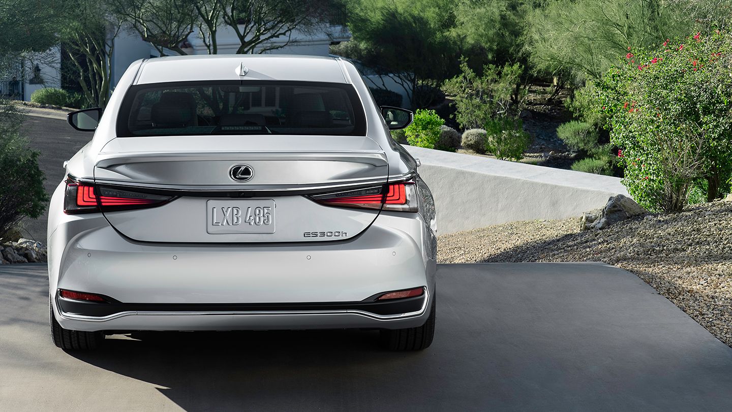 Rear view of a silver 2024 Lexus ES Hybrid in LA
