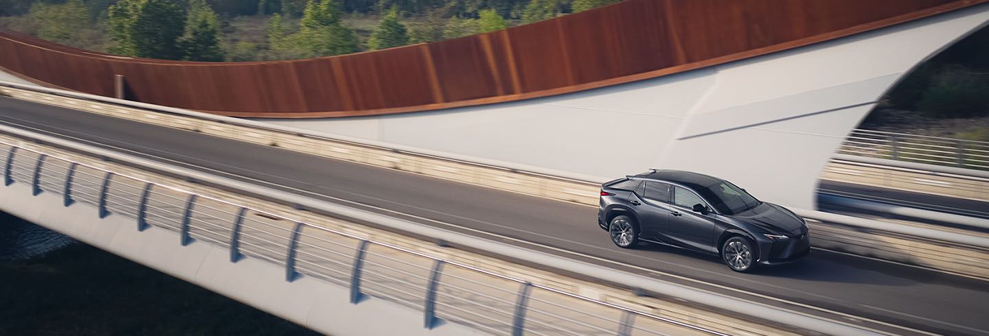 Exterior of the Lexus RZ shown in Cloudburst Gray.