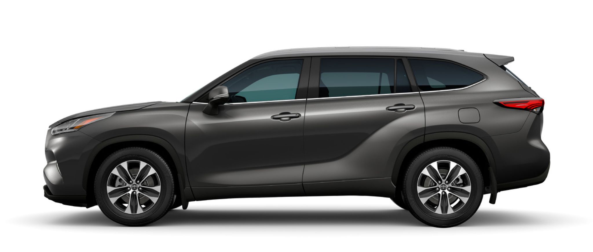 Side view of a 2022 Toyota Highlander SUV in Magnetic Gray color on a white background.