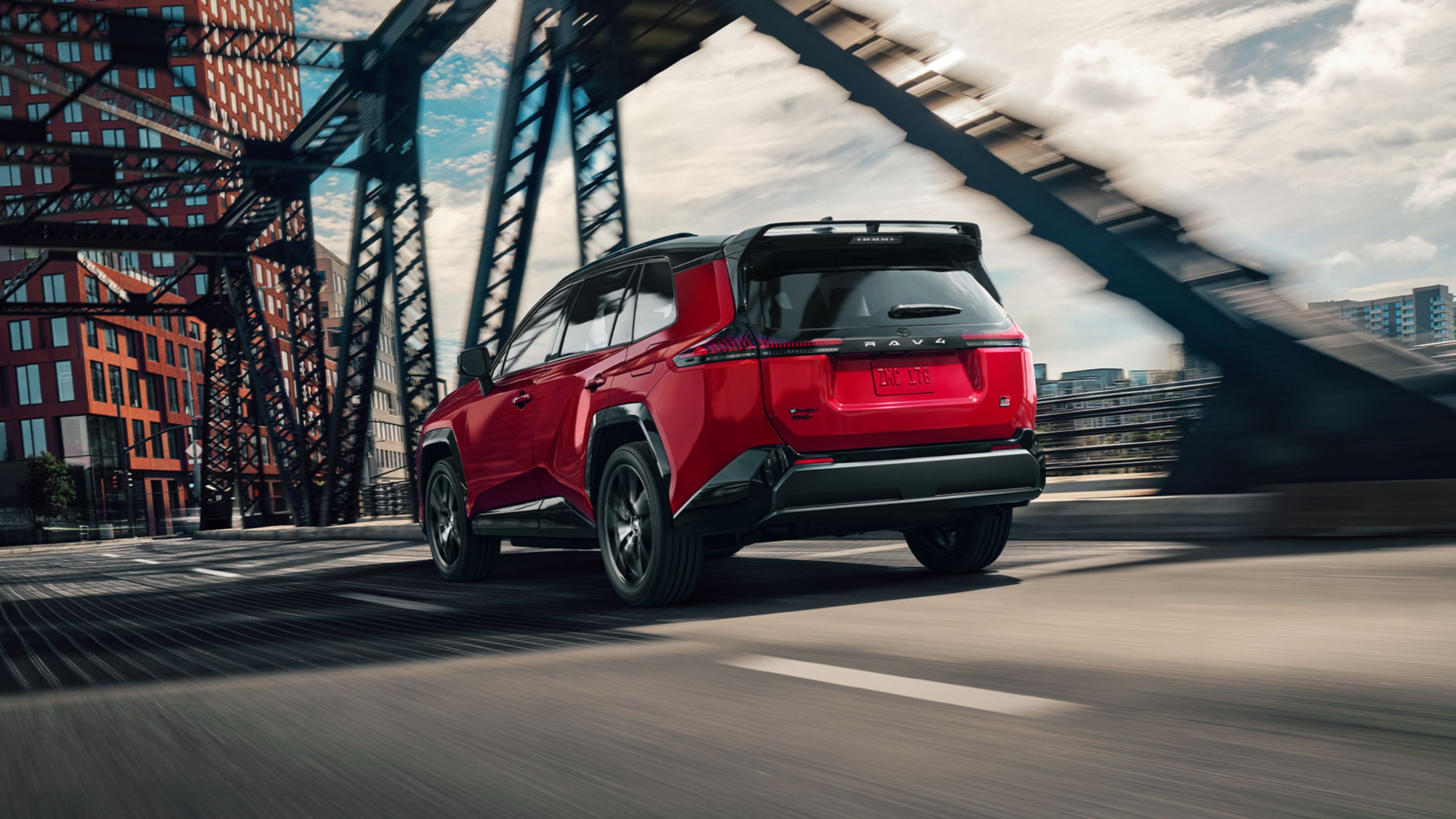 Red 2026 Toyota RAV4 plug in hybrid