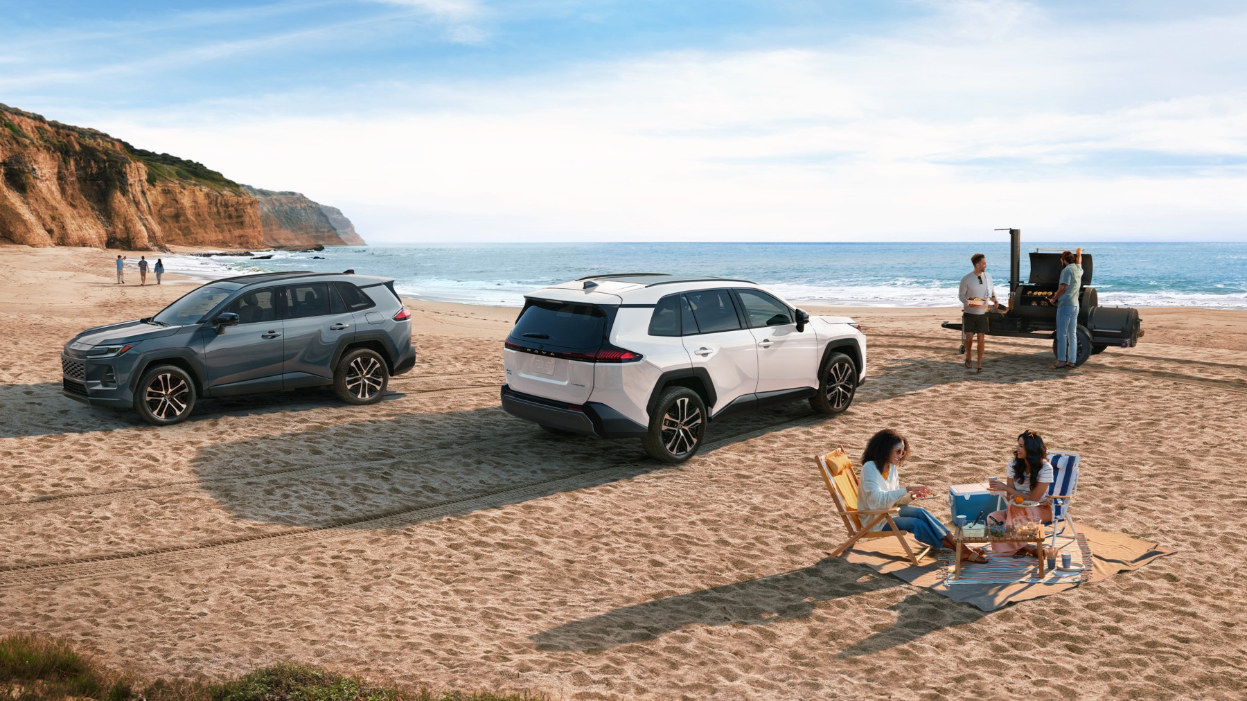 Toyota Wind Chill Pearl Exterior RAV4 parked on a sandy beach