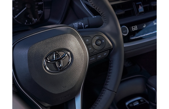 2023 Toyota Corolla LE interior shown in Black premium fabric.