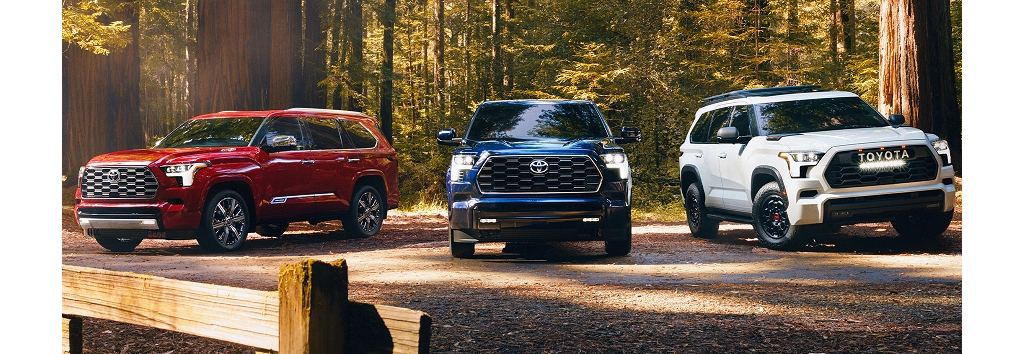 2023 Toyota Sequoia Capstone 4x4 shown in Supersonic Red, Platinum 4x4 shown in Blueprint, and TRD Pro shown in Ice Cap.