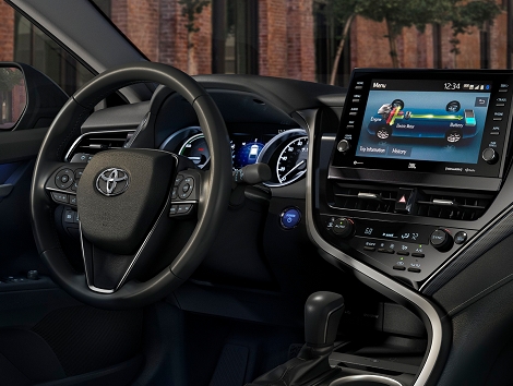 An interior view of the dashboard of a 2023 Toyota Camry Hybrid.
