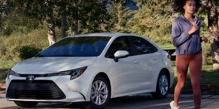 2023 Toyota Corolla LE shown in Wind Chill Pearl, an extra cost color, with LE Convenience Package.
