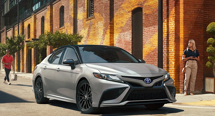 A 2023 Toyota Camry Hybrid in the color Celestial Silver Metallic.