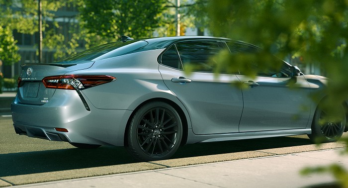 A 2023 Camry XLE shown in Wind Chill Pearl, an extra cost color.