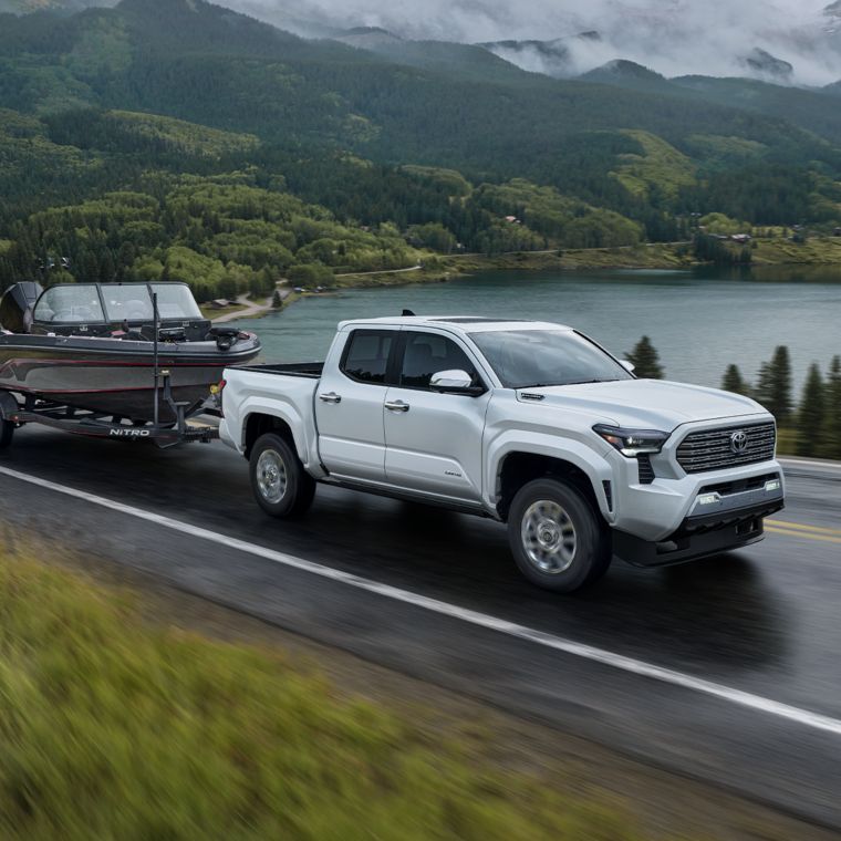 a truck pulling a boat 