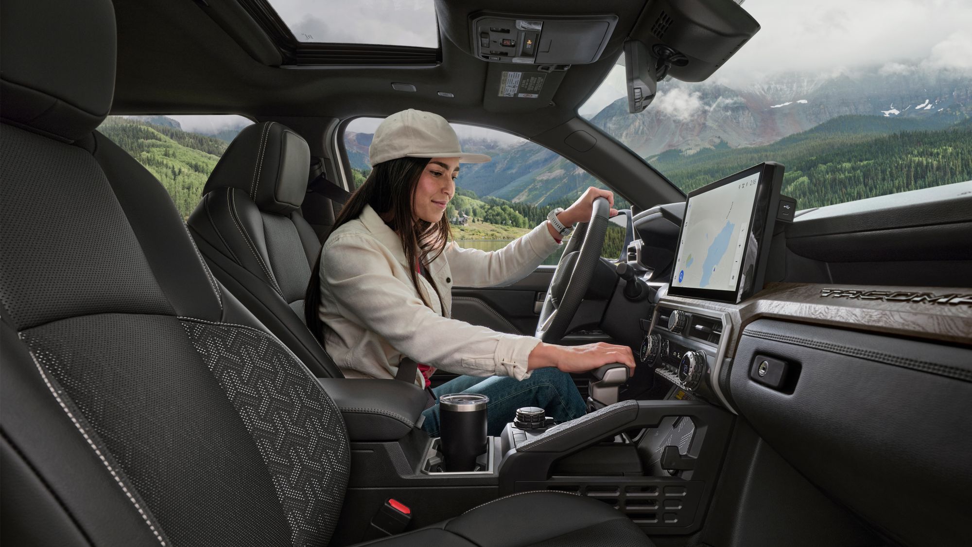 a women putting a truck into gear