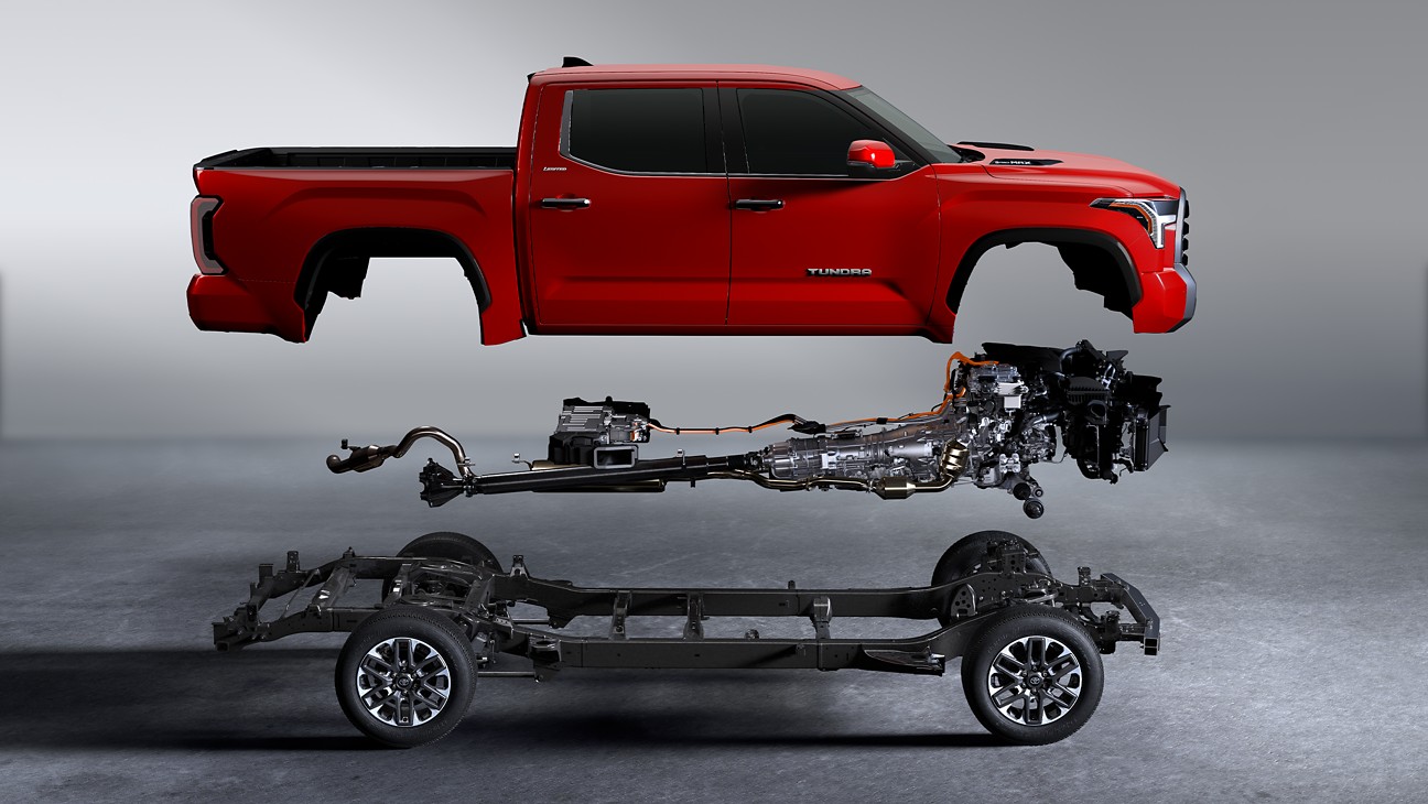 a red truck broken down to show underneath the vehicle