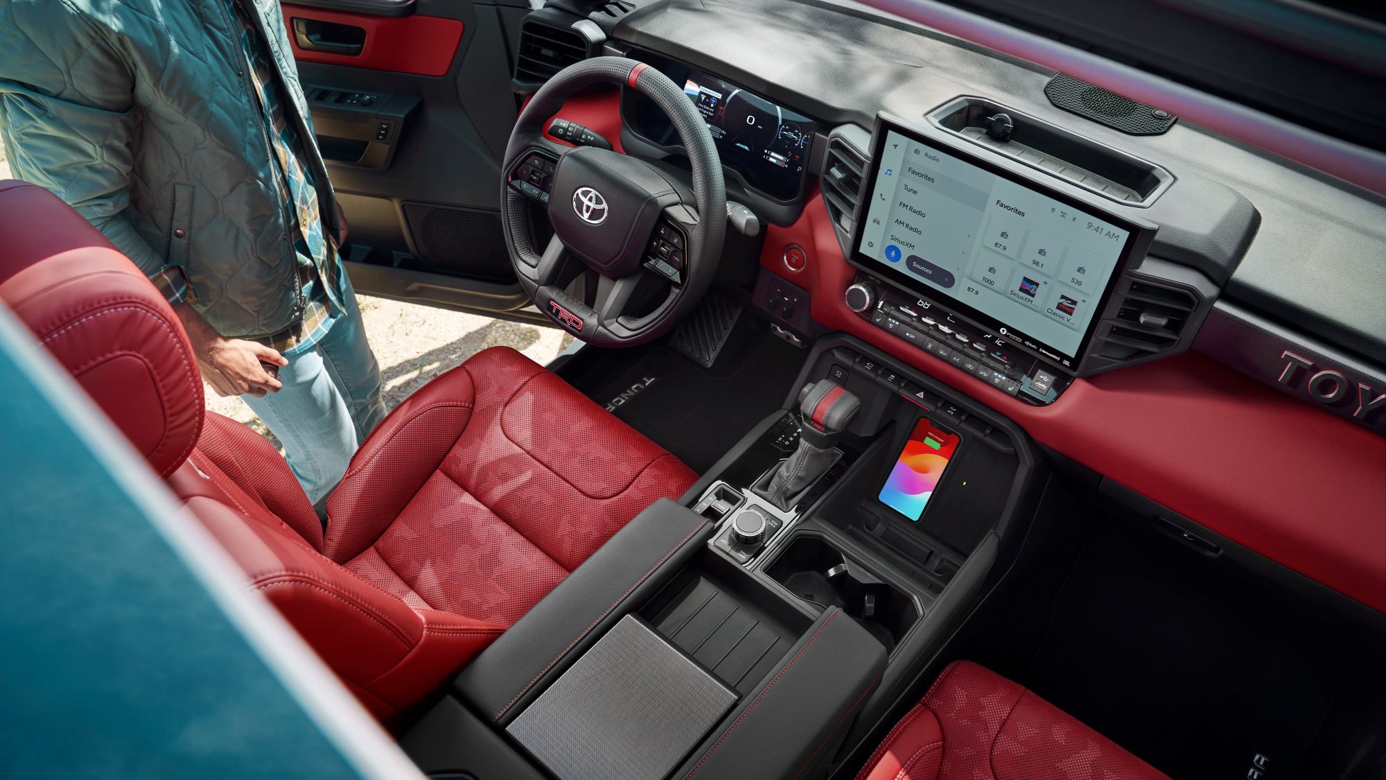 Birds eye view of 2024 TRD Pro CrewwMax with Cockpit Red leather accented interior with wireless phone charger