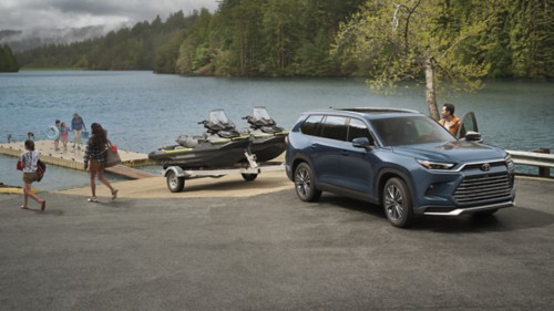 2025 Toyota higlander at a lake dock towing Sea-Doo