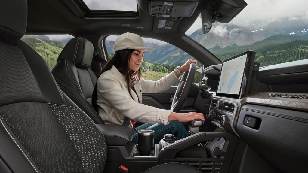 Women using 2025 Tacoma shifter