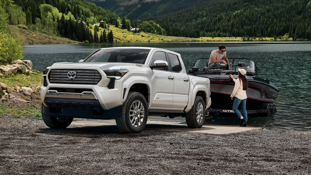 2025 Toyota Tacoma towing a mid sized boat