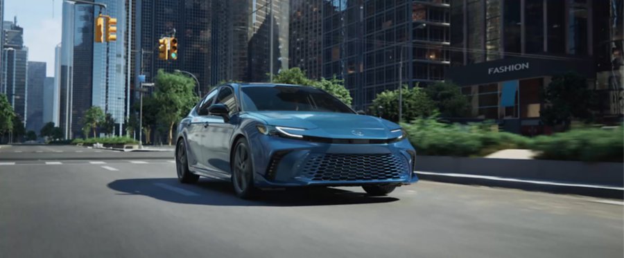 2026 Toyota Camry driving on a city street