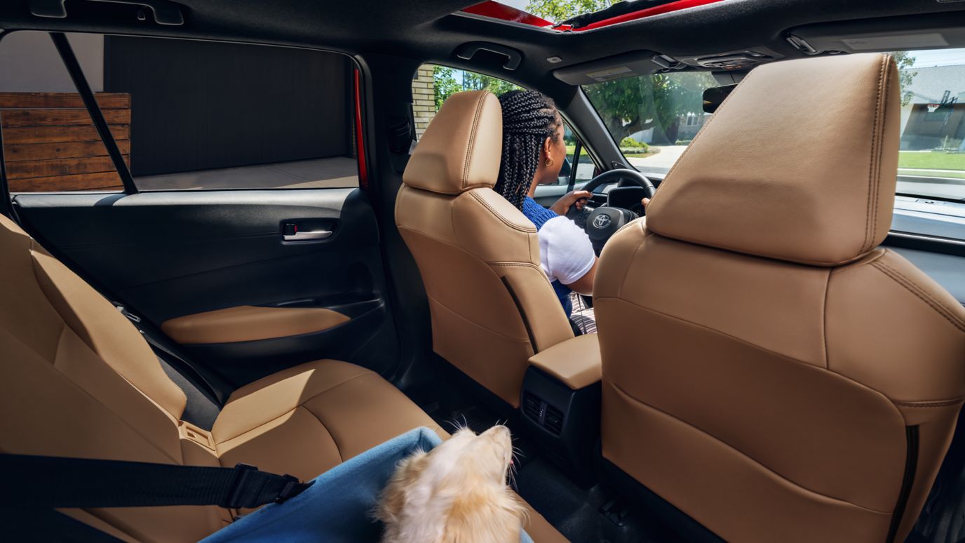 2026 Toyota Corolla Cross XLE interior shown in Portobello SofTex® trim. Prototype shown with options.