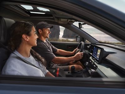 Official Toyota image of the 2026 RAV4 Hybrid Woodland interior in Mineral SofTex trim