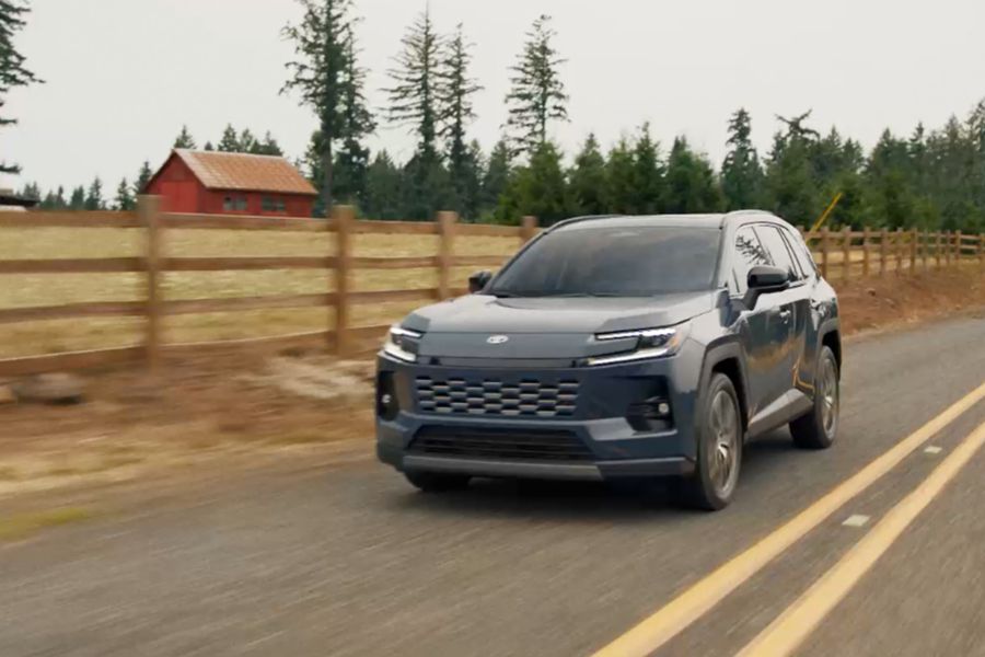 Toyota RAV4 driving on a country road