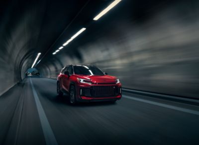 Official Toyota image of the 2026 RAV4 Plug-in Hybrid GR SPORT in red with a black roof