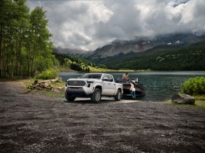 Toyota Tacoma at a mountain lake